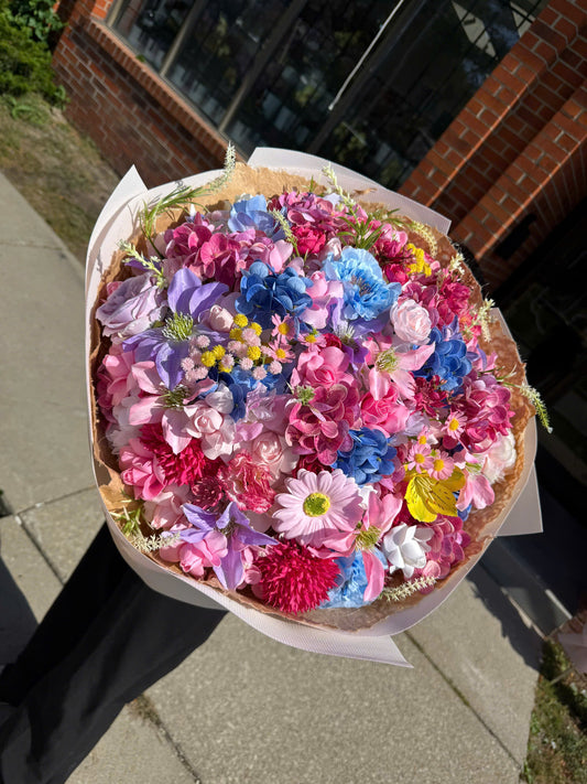 Mixed flower bouquet with white wrapping paper