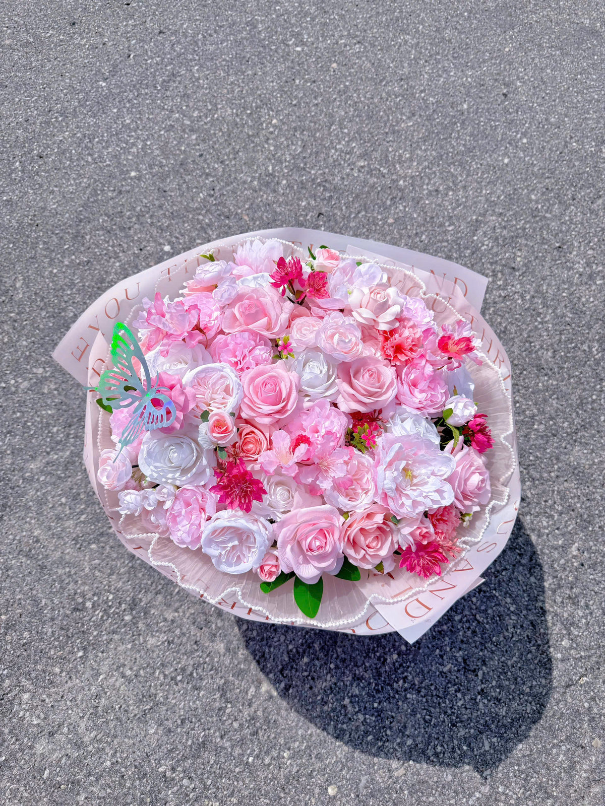 Silk flowers mixed with realistic silicone roses