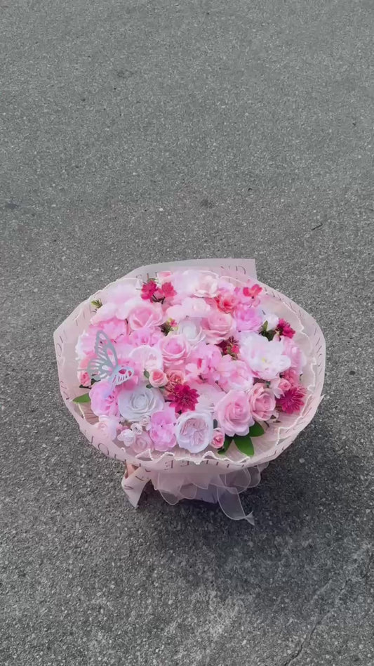 Silk flowers mixed with realistic silicone roses